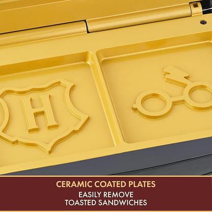 Warner Brothers Harry Potter Dual Sandwich Maker by Select Brands - Ceramic Coated Cooking Plates - Imprints Hogwarts Crest and Harry Potter Glasses on Toasted Sandwiches, Black and Gold, WBH-100SM