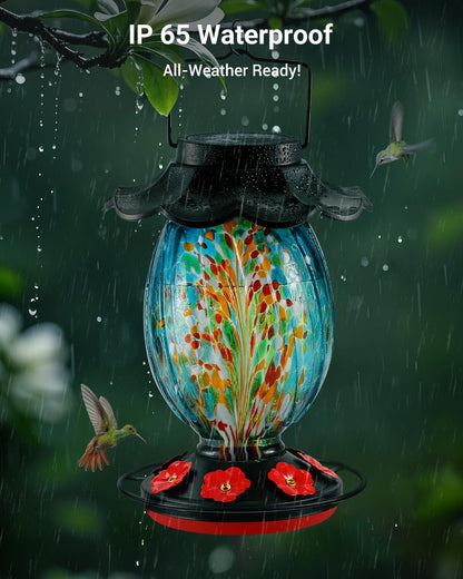 Solar Hummingbird Feeder - 49 fl.oz Hand Blown Glass Color Changing - 7 Feeding Ports with Perch - Never Leak - Perfect Hummingbird Feeder for Outdoors Hanging (Blue)