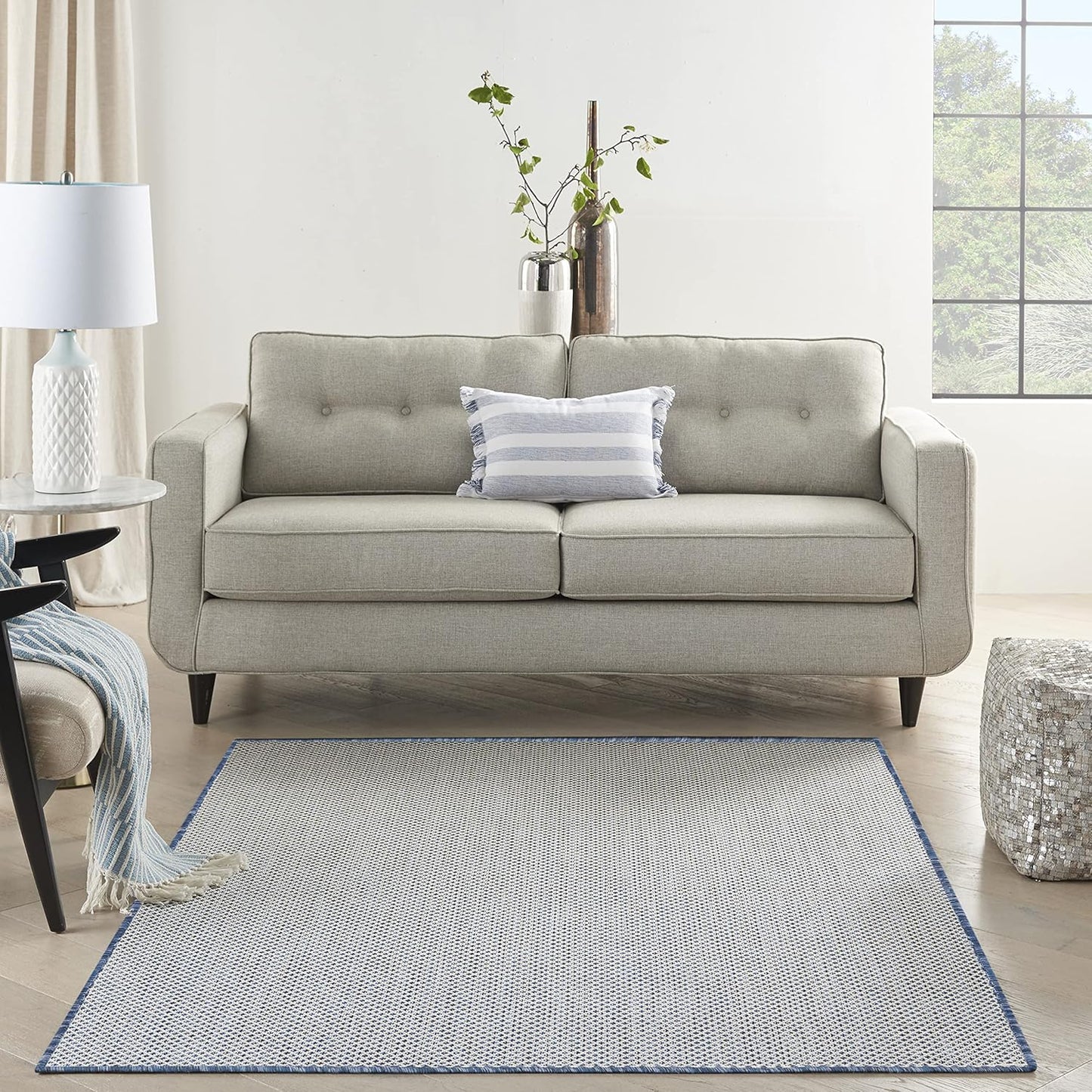 Nourison Home Courtyard 60" x 84" Fabric Indoor/Outdoor Rug in Ivory Blue